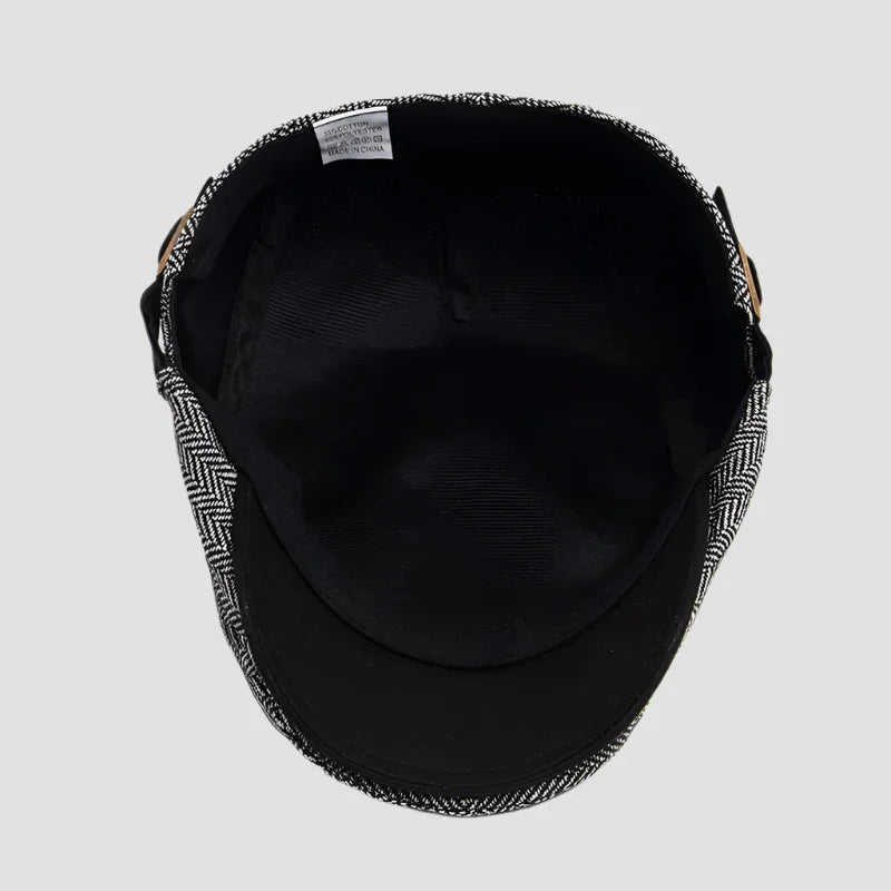 Herringbone newsboy cap.