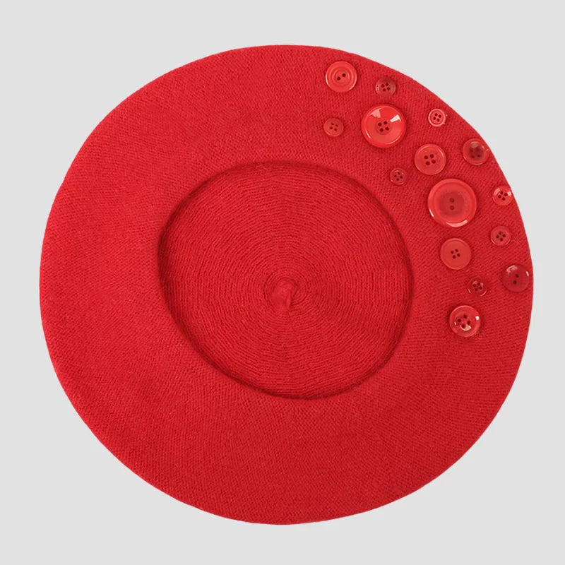 Red beret with buttons.