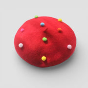Red Candy Beret with colorful fluffy pom-poms