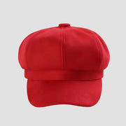 Red Newsboy Cap: vibrant suede-textured flat cap with structured crown and wide brim