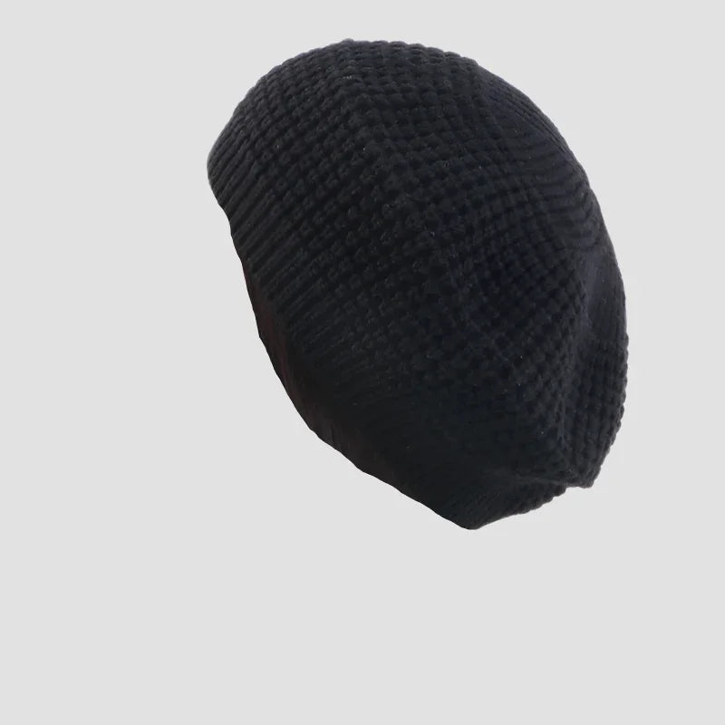 Black knitted beret.