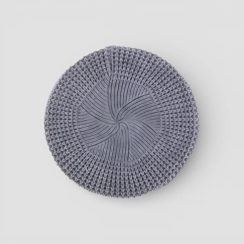 Simple Beret Crochet Pattern: heathered gray knitted beanie with spiral texture