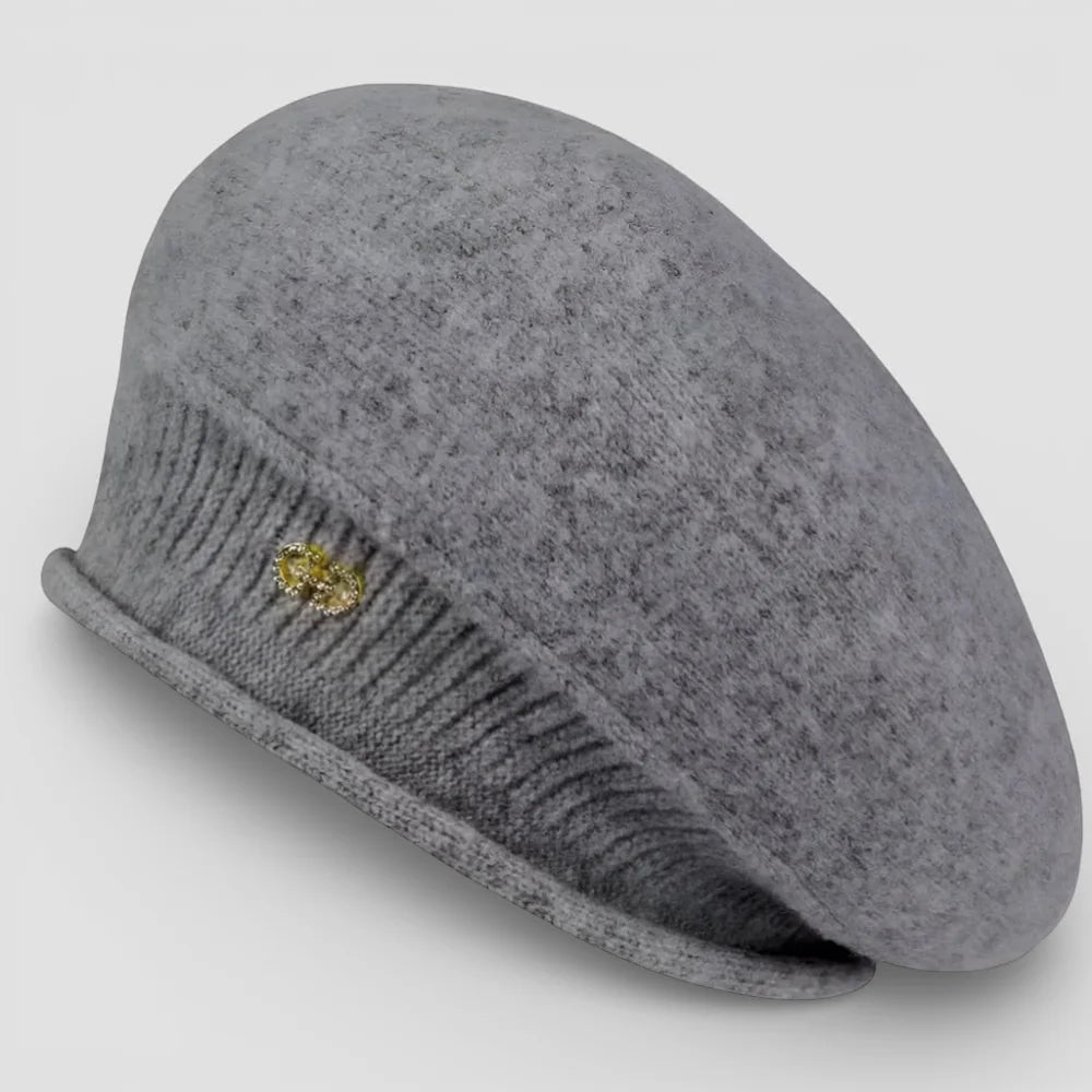 Slouchy wool beret in soft gray felt with ribbed knit brim and gold brooch