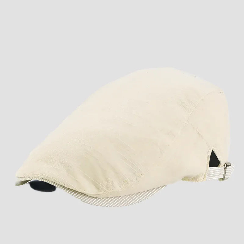 Beige flat cap.