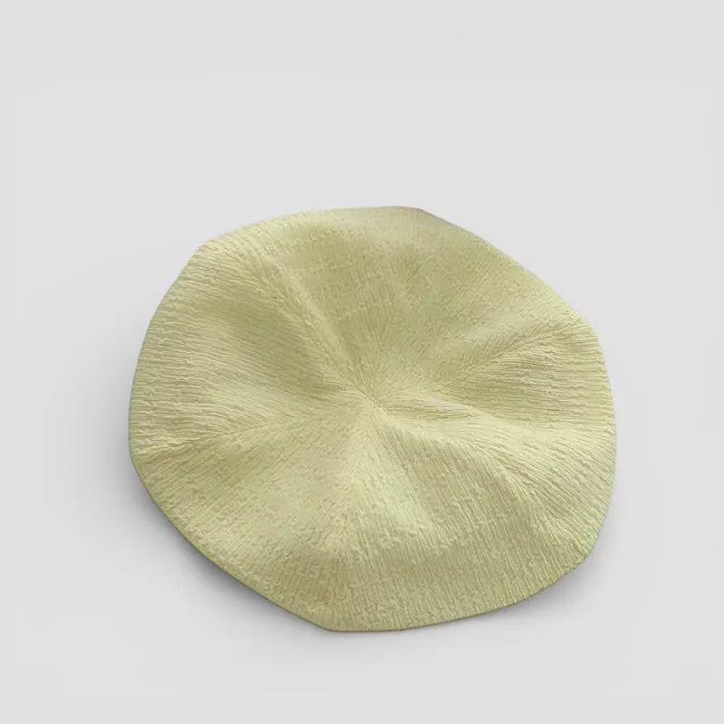 Summer Beret pale yellow textured disc with radial pattern