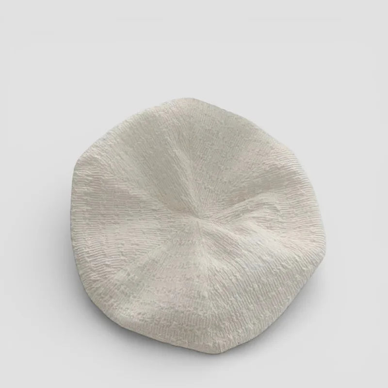 Summer Beret white textured ceramic dish with radial pattern
