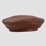 Brown faux leather beret.