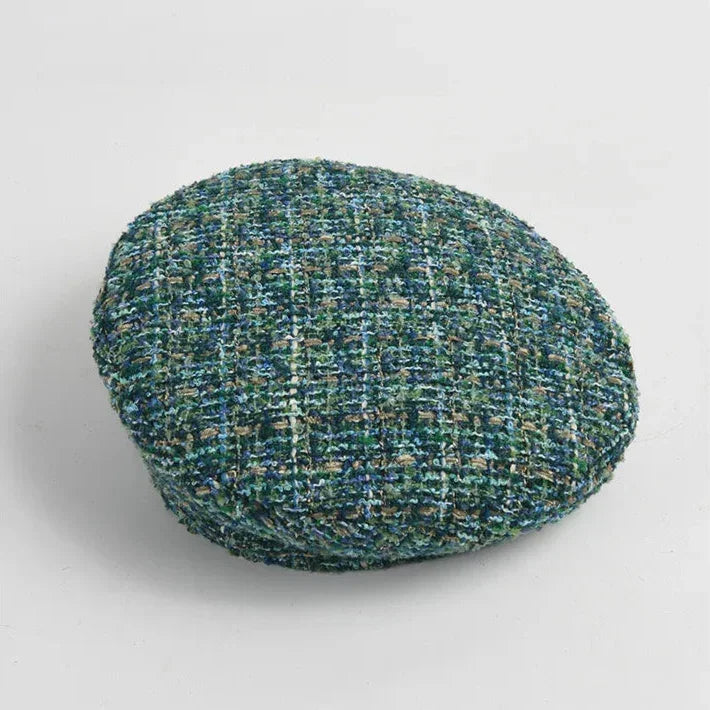 Green tweed flat cap.