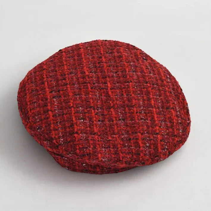 Traditional Basque Beret: round red tweed cap with textured woven pattern