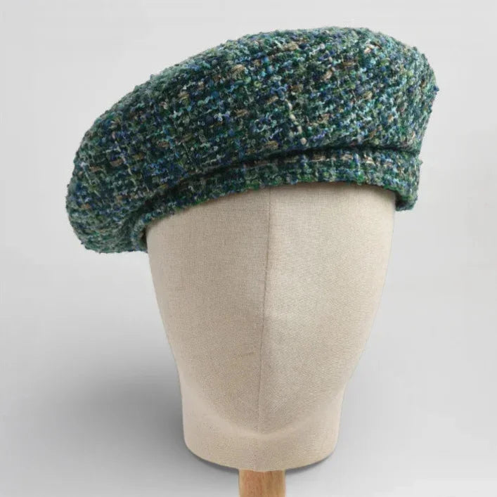 Traditional Basque Beret in textured green tweed with soft folded brim