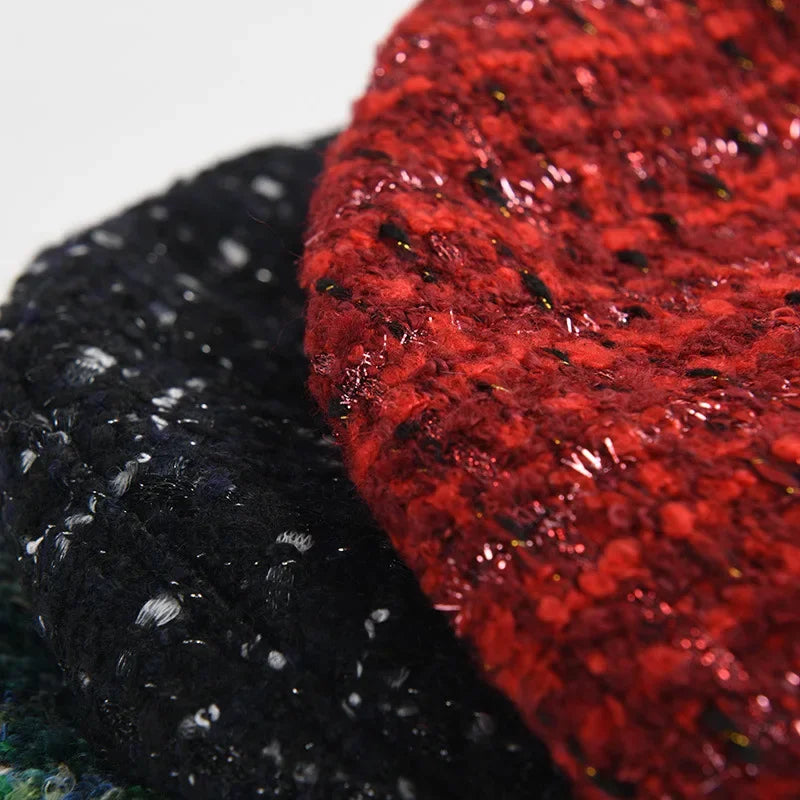 Textured red and black knit hats.