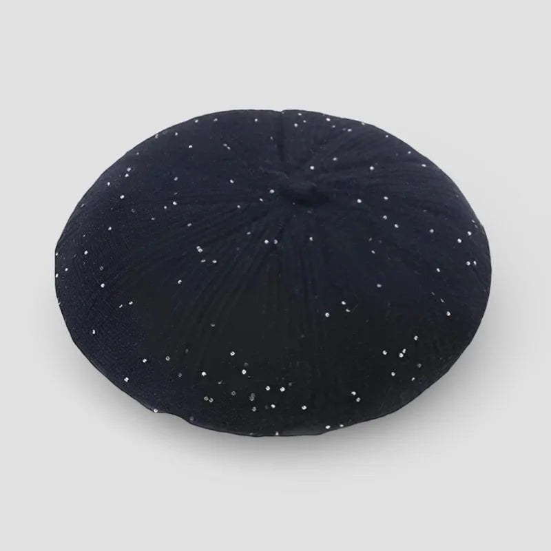 Velvet Beret black circular cushion with scattered white sparkles