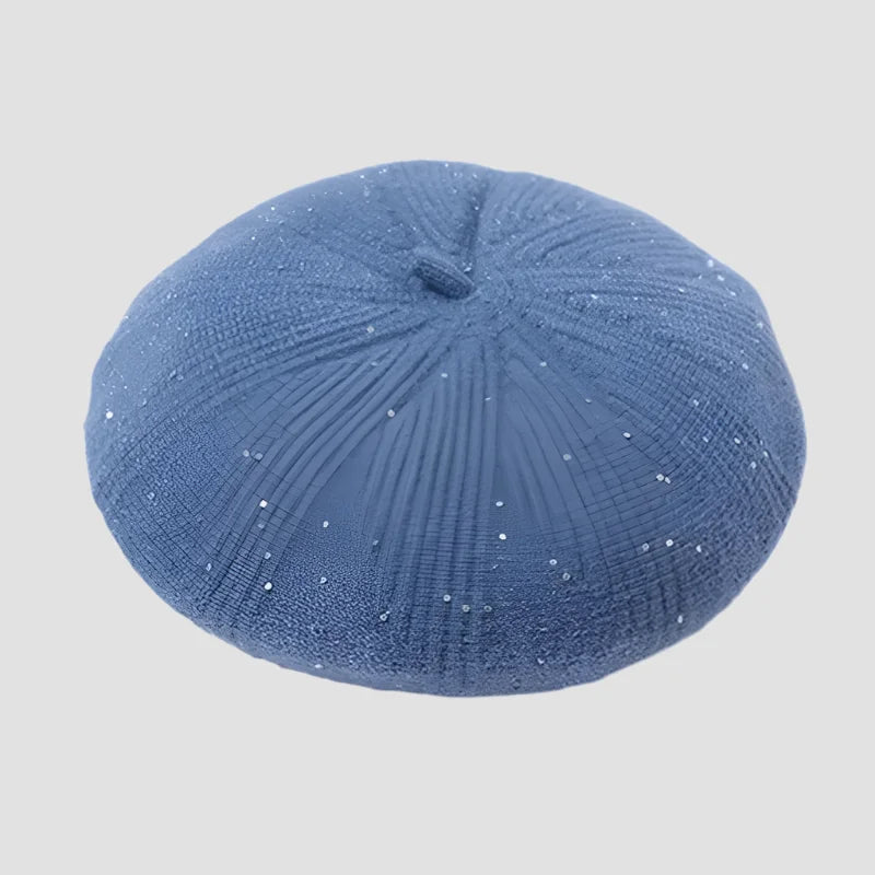 Blue beret with sparkly accents.