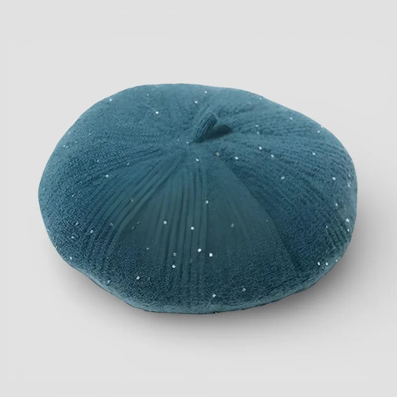 Teal velvet beret with star-like sparkles and soft texture