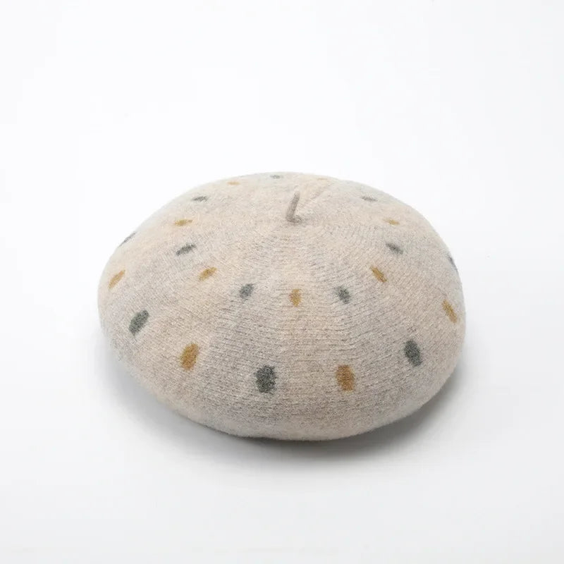 Beige beret with colored dots.