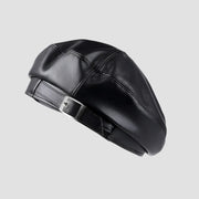 Black faux leather beret with buckle.