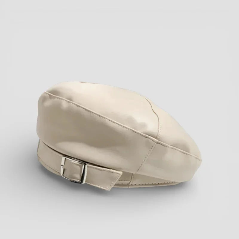 Vintage leather beret in cream color with silver buckle strap
