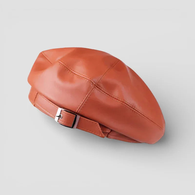Vintage leather beret in rust-orange faux leather with silver buckle strap