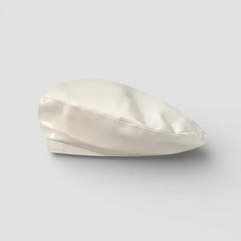 Cream-colored satin beret with glossy finish and edge stitching