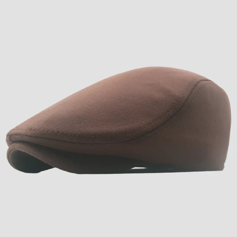 Brown flat cap.