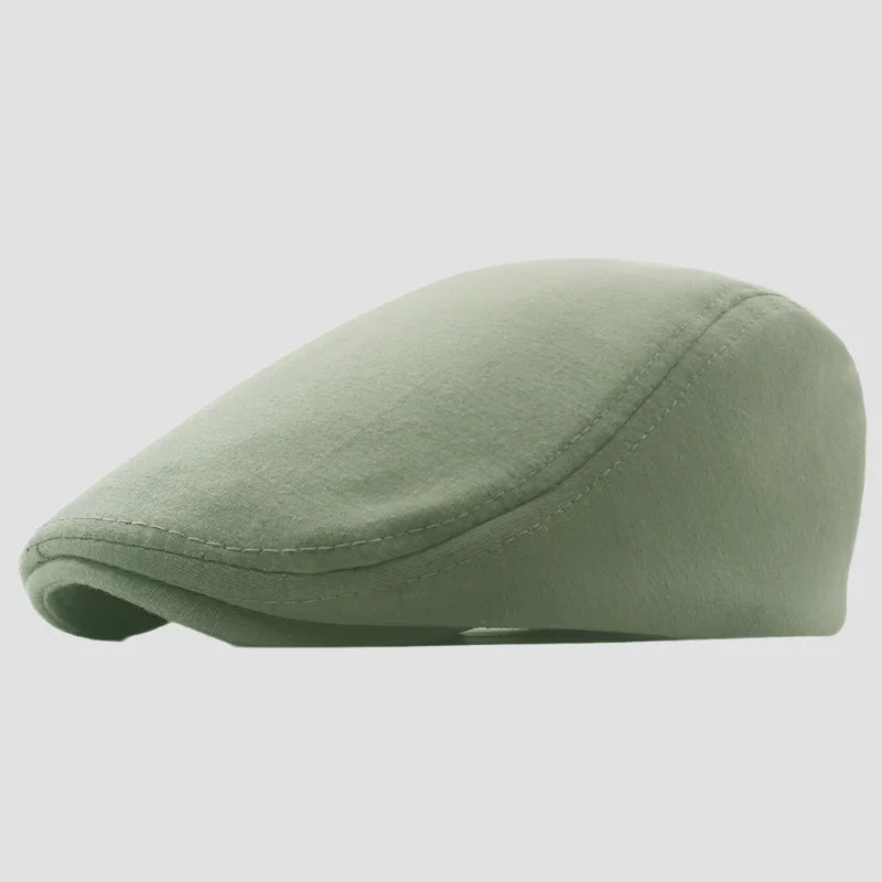 Green flat cap.