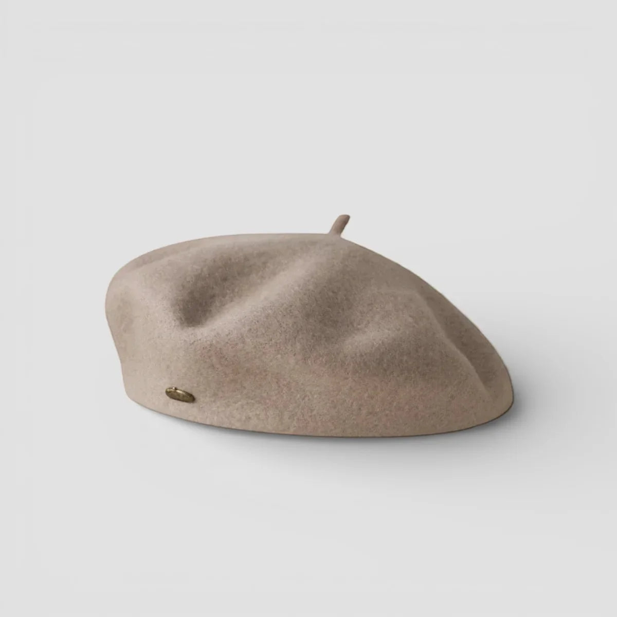 Wool beret women’s beige felt hat with gold side emblem