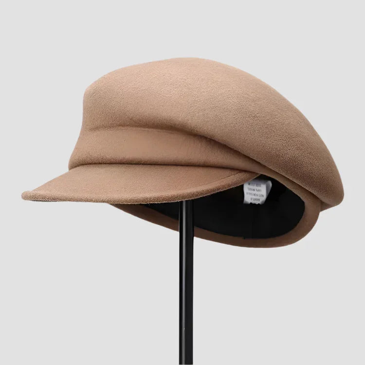 Beige wool newsboy cap.